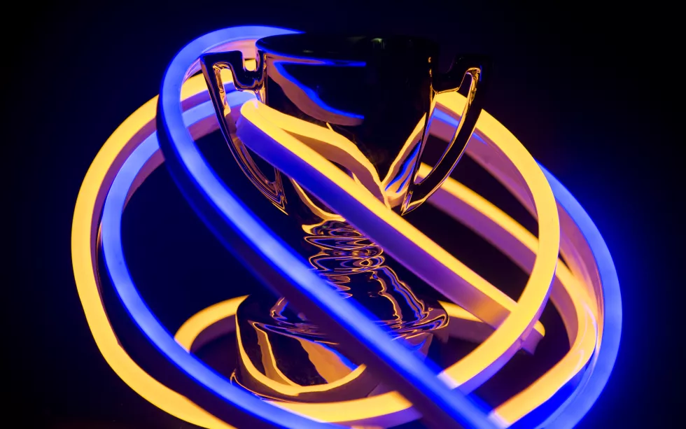 trophy covered neon lights