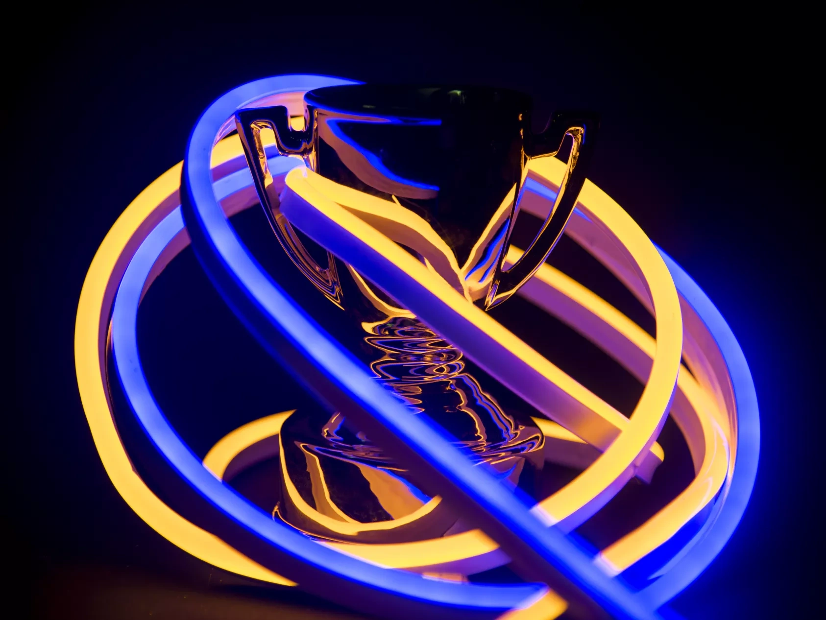 trophy covered neon lights